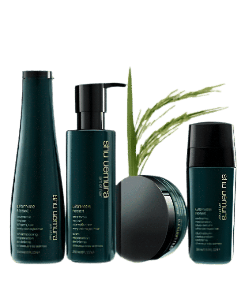 Shampoo and hair care products on display with plant accents.