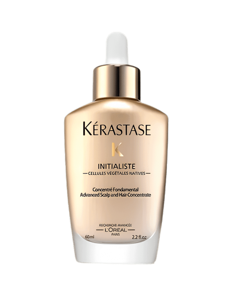 Kérastase Initialiste serum bottle, gold with dropper, for scalp and hair care.
