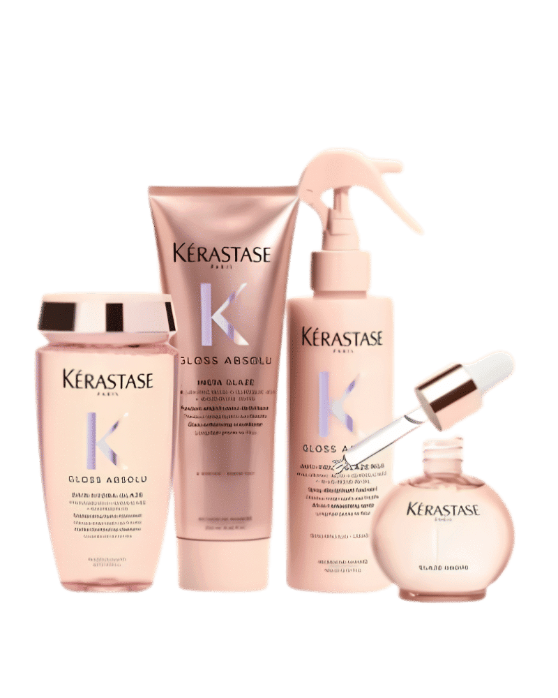 Kérastase Gloss Absolu hair care products set including shampoo, conditioner, and treatment.