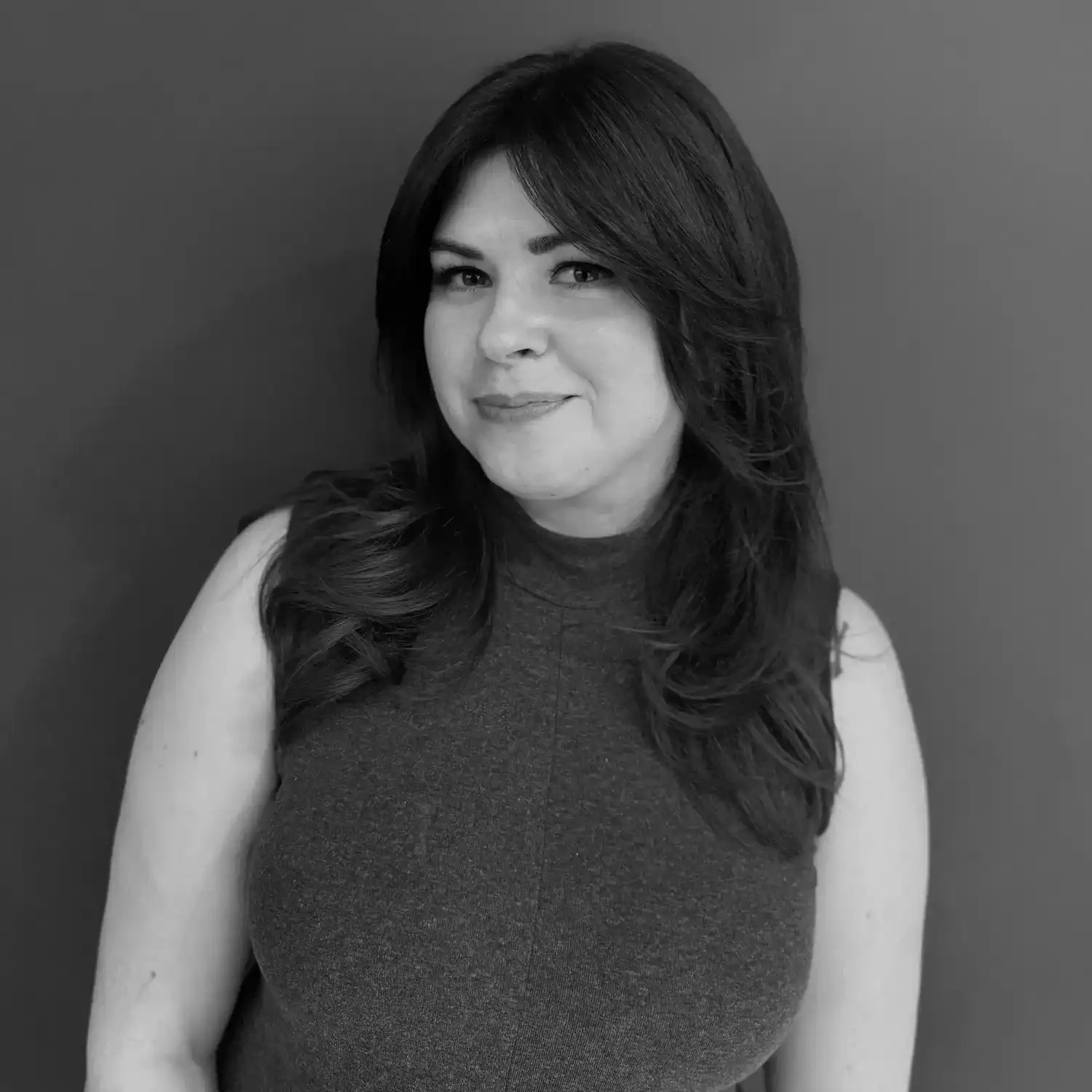 Portrait of Kristen Kell, a professional stylist at Salon SCK, showcasing their expertise and style.
