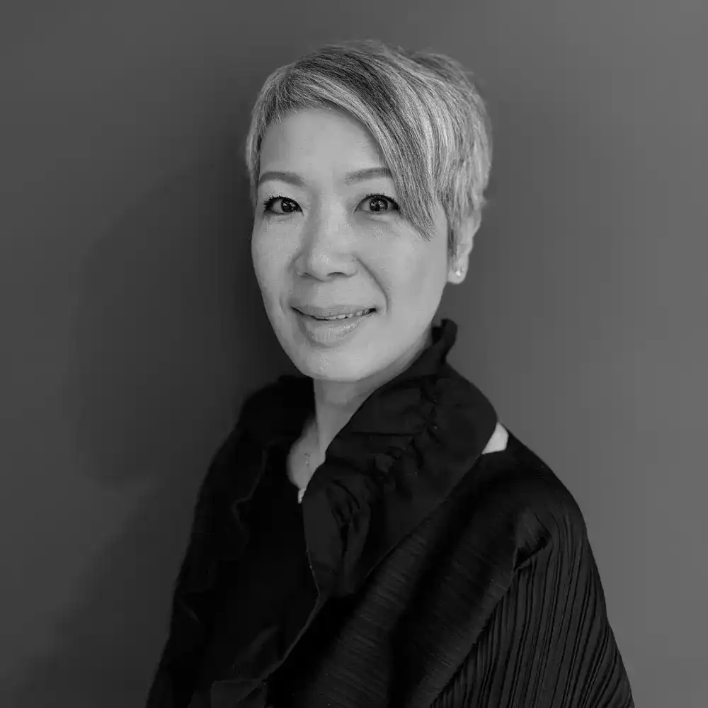 Portrait of Micelle Chung, a professional stylist at Salon SCK, showcasing their expertise and style.