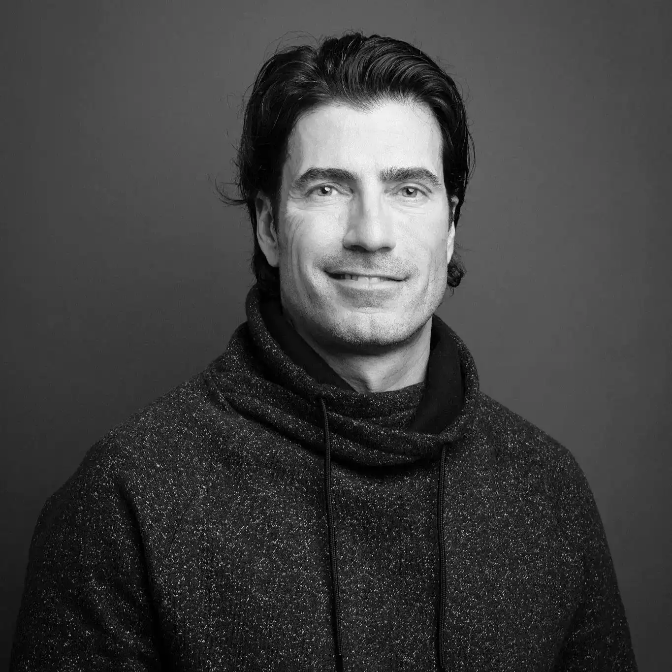 Portrait of Rene Fris, a professional stylist at Salon SCK, showcasing their expertise and style.